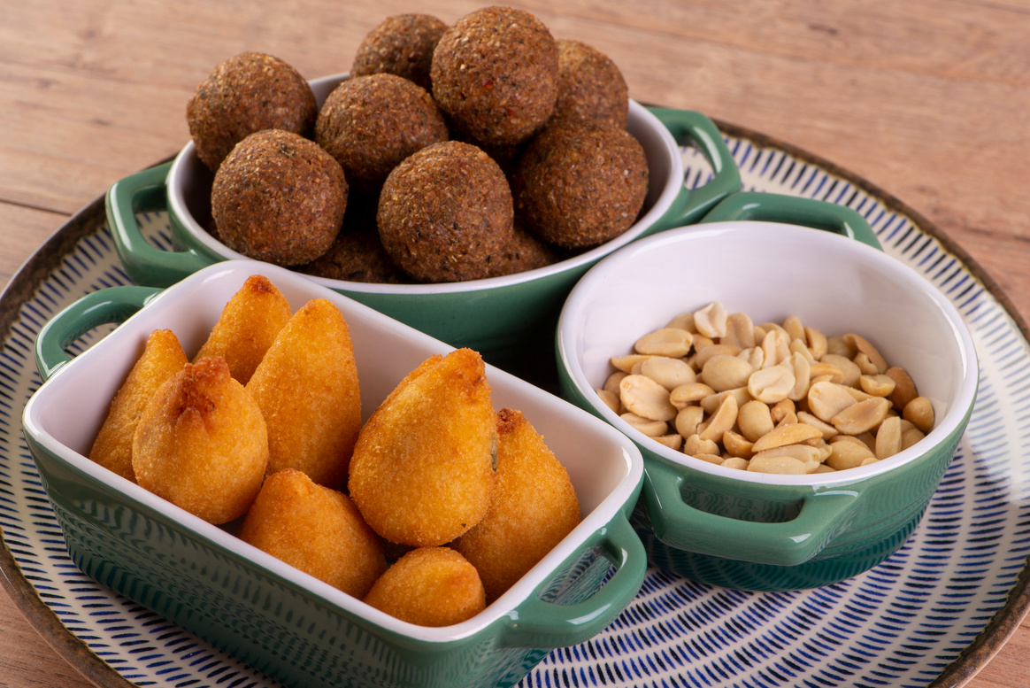 Mix of fried savory snack with coxinha, kebab and roasted and sa